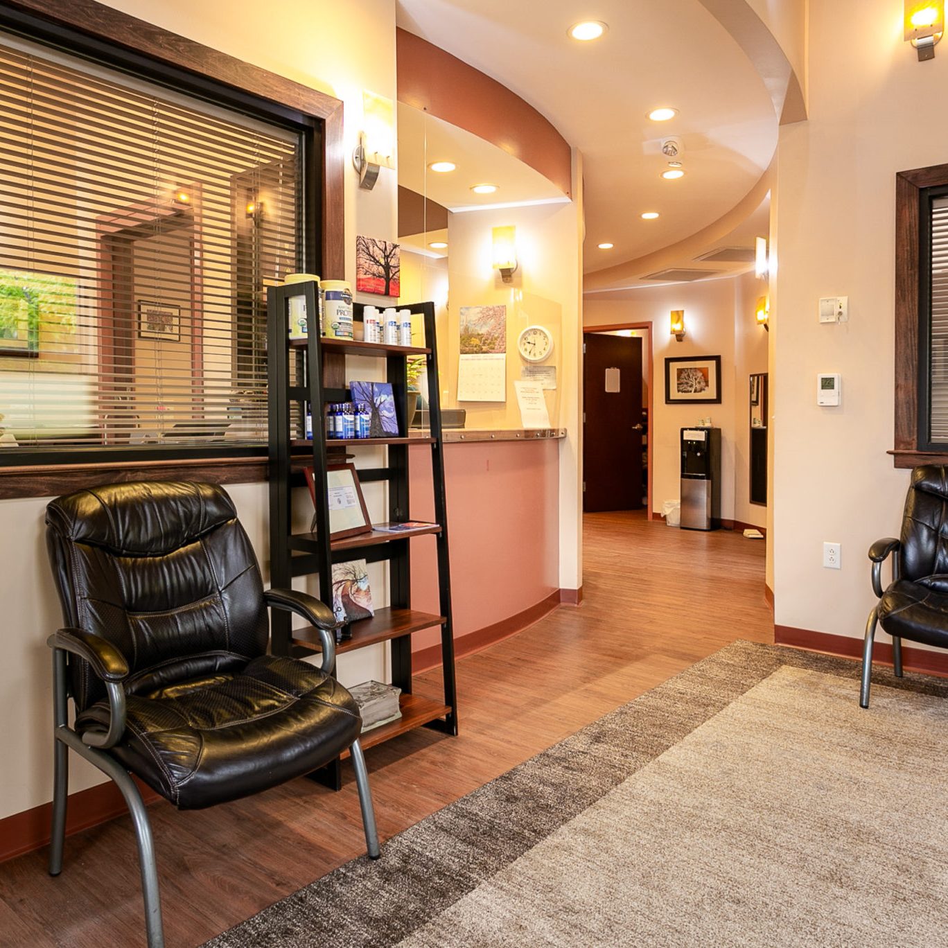 Comfortable patient waiting room and check-in desk at River Ridge Chiropractic & Acupuncture in Asheville, NC.